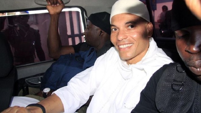 Senegal`s Karim Wade freed by Macky Sall and `flies to Qatar`